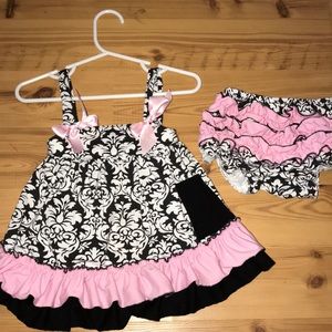 Baby dress size small  fits 4-6 months